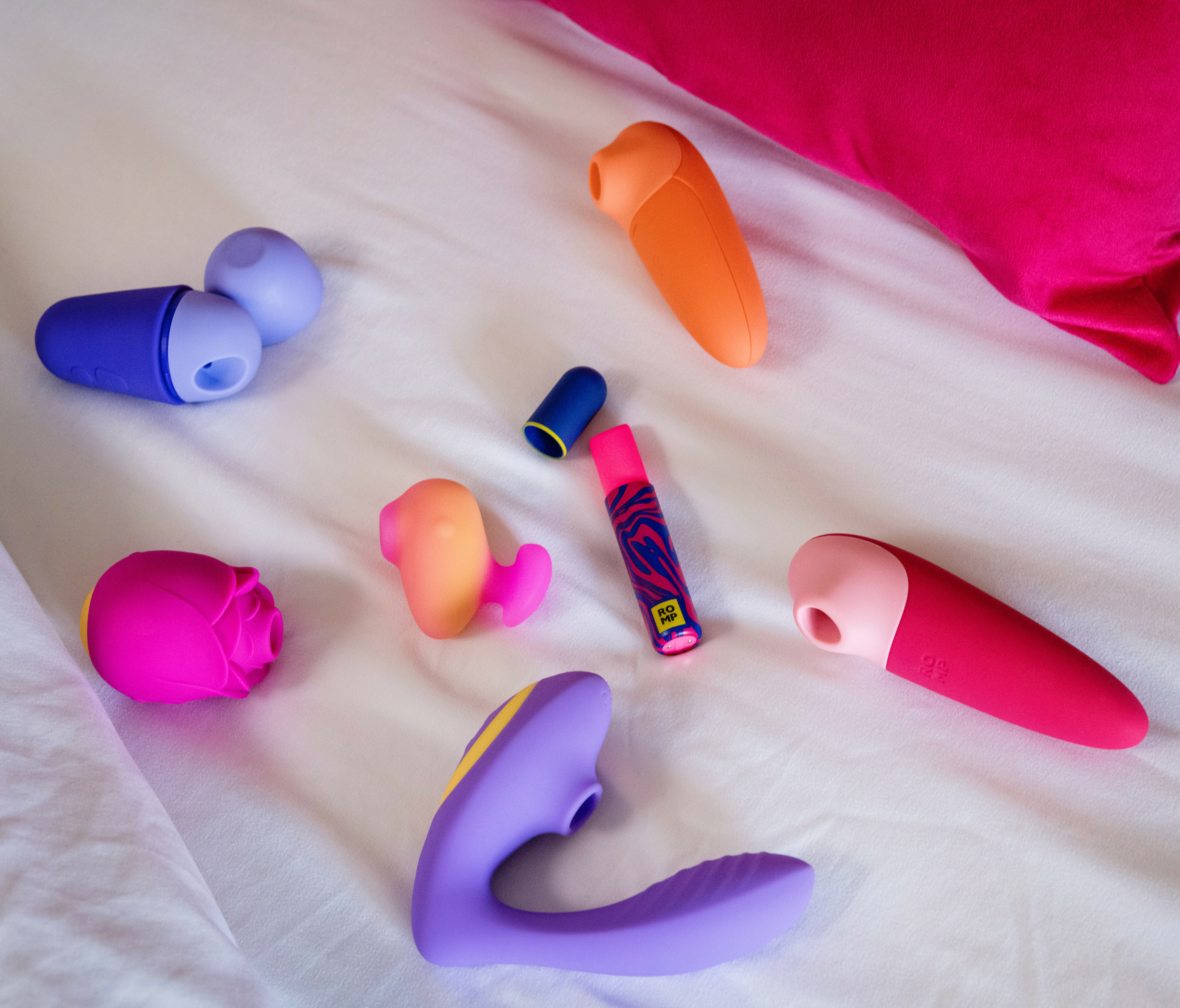 sextoy womanizer sur un lit